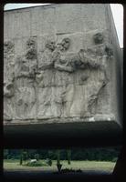 Chelmno Concentration Camp : Close-up of memorial bas-relief and memorial flame