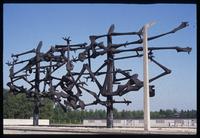 Dachau Concentration Camp : View through memorial sculpture to barracks complex