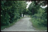Belzec Concentration Camp : Main tourist memorial entry gate from tourist parking lot