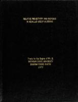 Relative projectivity and radicals in modular group algebras