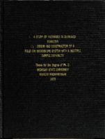 Part I: A study of vacancies in quenched tungsten. Part II: Design and construction of a field ion microscope system with a multiple sample capability