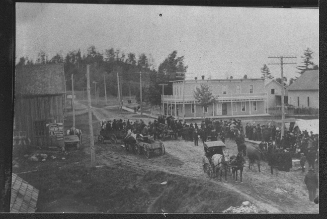 Main Hotel with horse-and-buggies