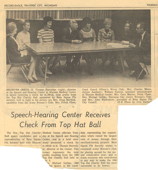 Speech Hearing Center Receives Check From Top Hat Ball