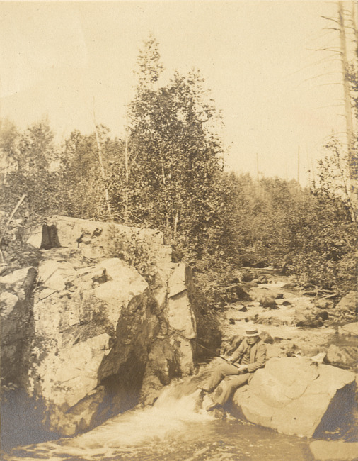 River in the Upper Peninsula with person fishing