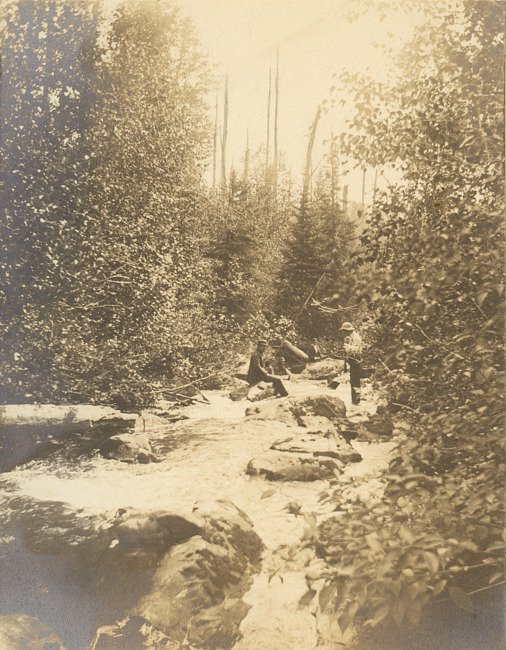 River in the Upper Peninsula with person fishing