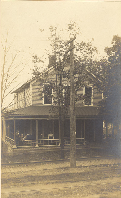 House with people on porch