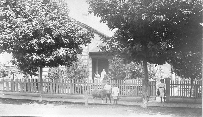 Saugatuck Christian Reformed Church parsonage, children with sheep