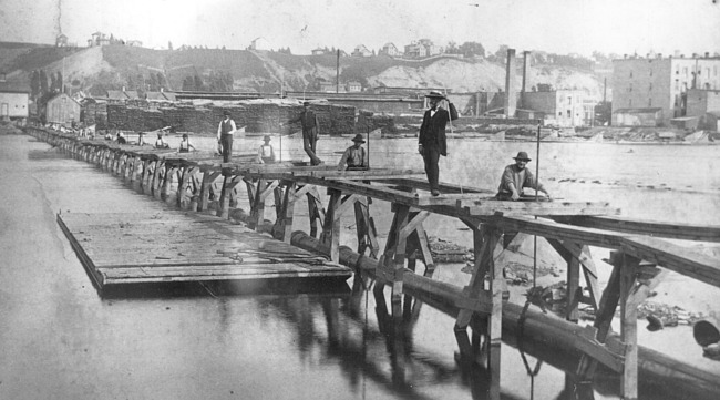 Water main under Grand River