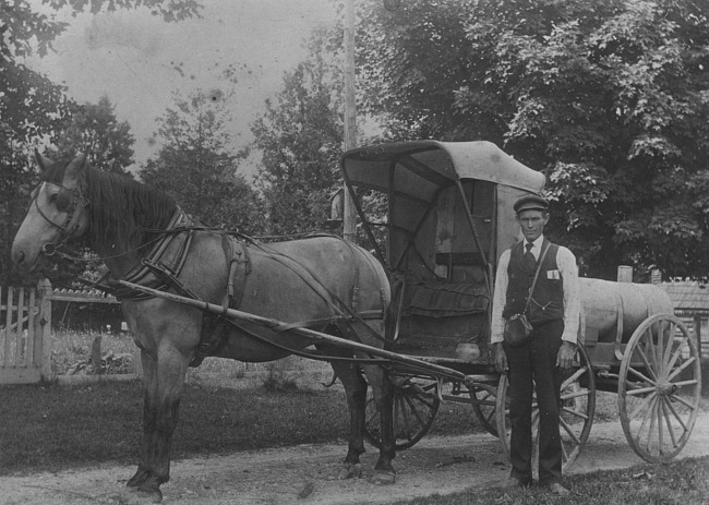 Joshua Quist with wagon selling kerosene