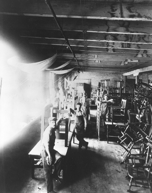 Men working at furniture factory
