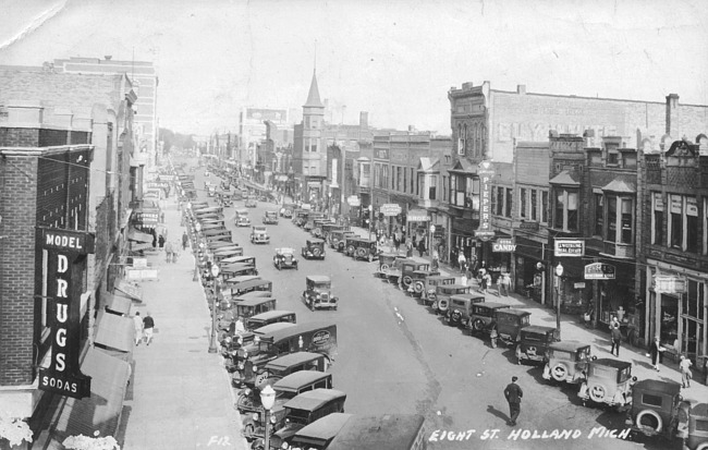 Lots of cars on 8th St.