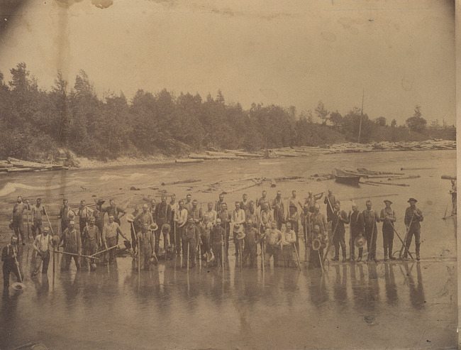 48 Log Men Posing in Thunder Bay River