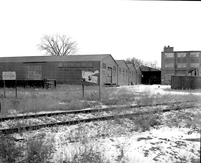 Rear view of the empty Daisy Manufacturing Company building, 1961