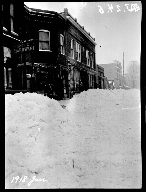 Geo. Huston's, Taylor Bakery and Schrader Building on Penniman Avenue