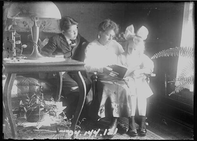 Satie Draper Reading to Children