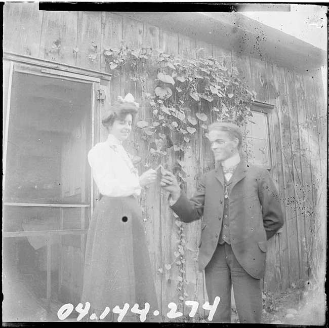 Man and Woman Holding a Wishbone