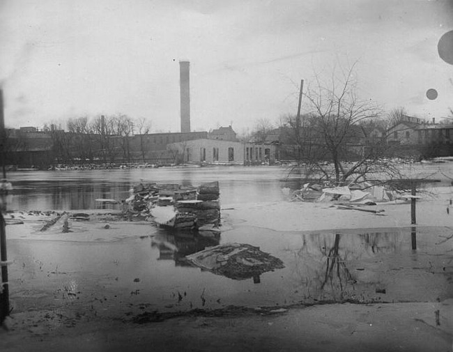 Photo of Flood, River Street with Standpipe in background, Lansing, 1904
