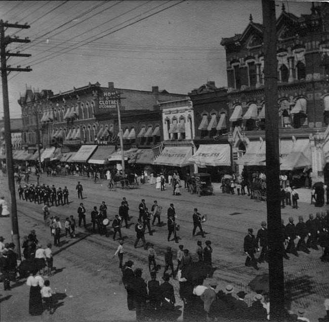 View of North Washington Avenue with parade, 200 Block, Lansing