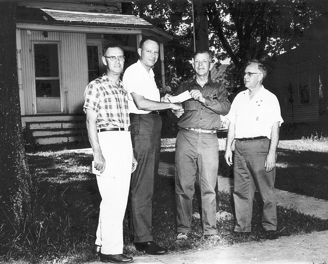 Four Men and a Check