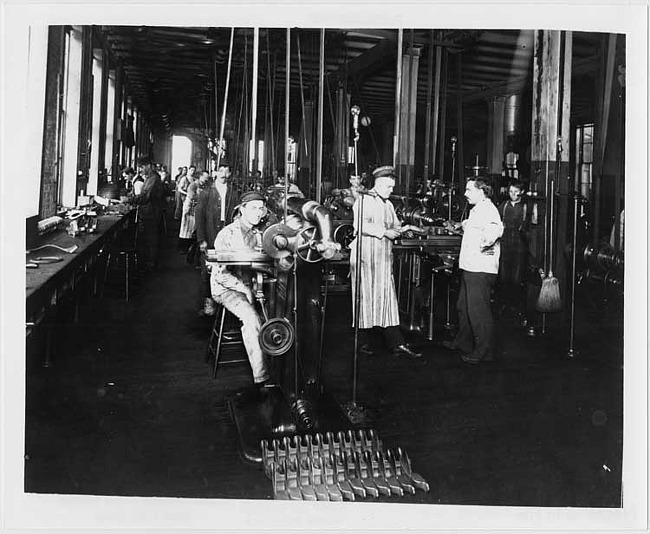 Men at work in Cadillac Motor Car Company factory