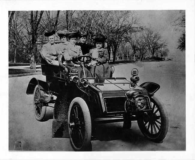 1903 Packard Model F with female driver and passengers