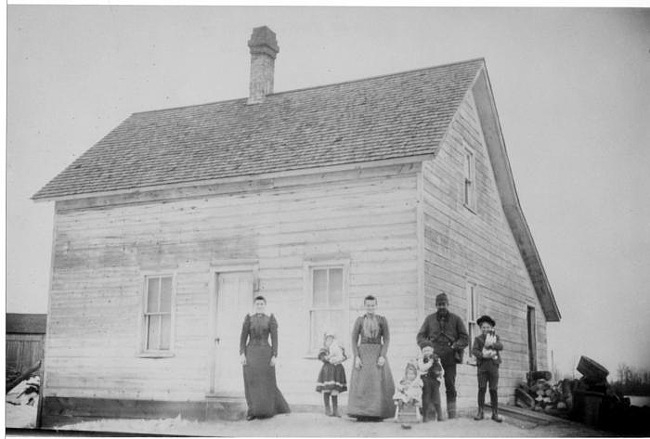 Marotz Family in front of their homestead