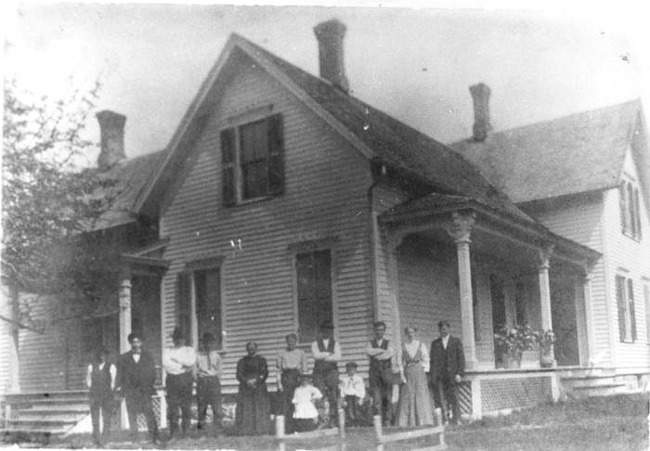 Ahrens extended family in front of their house