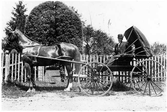 Arthur Sieger in front of Ahrens homestead with horse and buggy