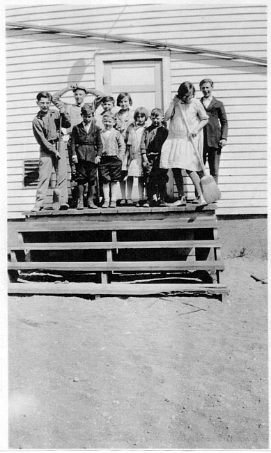 Plumbrook students on back steps of school