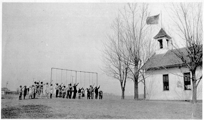 Plumbrook students salute the flag