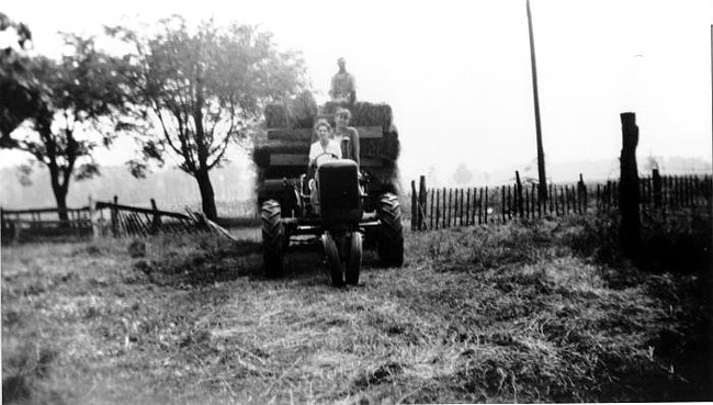 Eleanor Ahrens driving a tractor