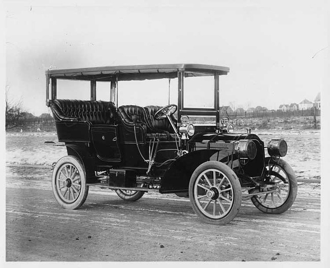 1906 Packard 24 Model S touring car on road, three-quarter front view