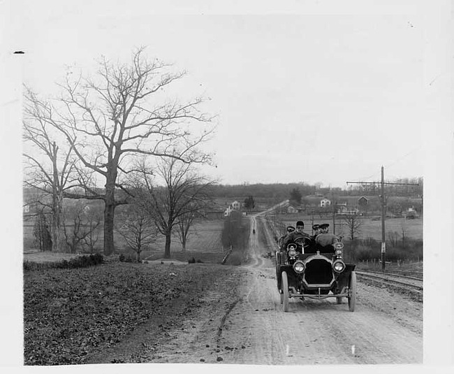 1907 Packard 30 Model U touring car on Woodward Ave. south of Long Lake Rd.