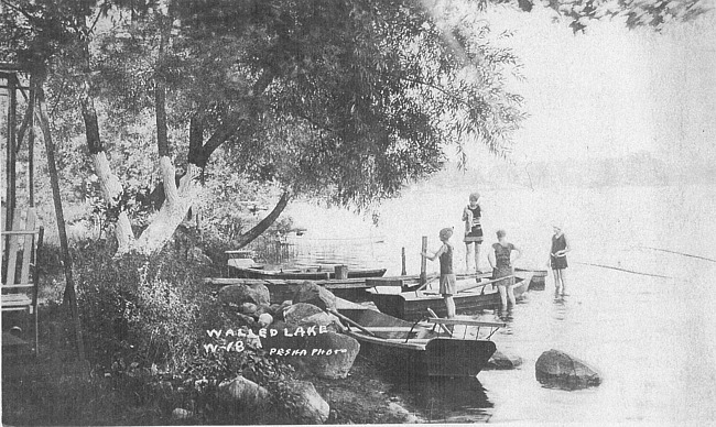 Rowboats docked on Walled Lake, c. 1900