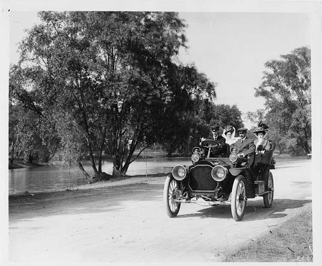 1909 Packard 30 Model UB on Belle Isle with male driver, and three passengers