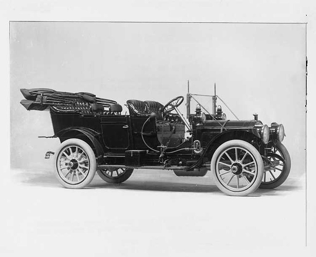 1910 Packard 30 Model UC touring car, three-quarter front view, right side, top lowered