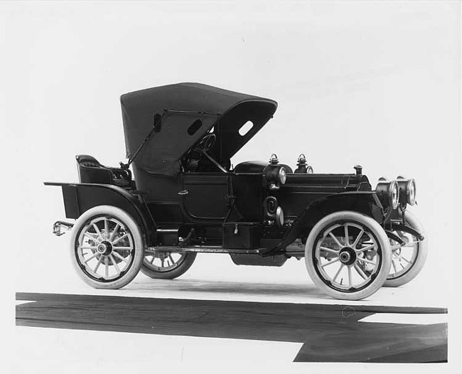 1911 Packard 18 Model NCS runabout, three-quarter front view, right side, top raised