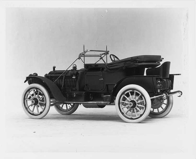 1911 Packard 30 Model UDS runabout, three-quarter rear view, left side, top lowered