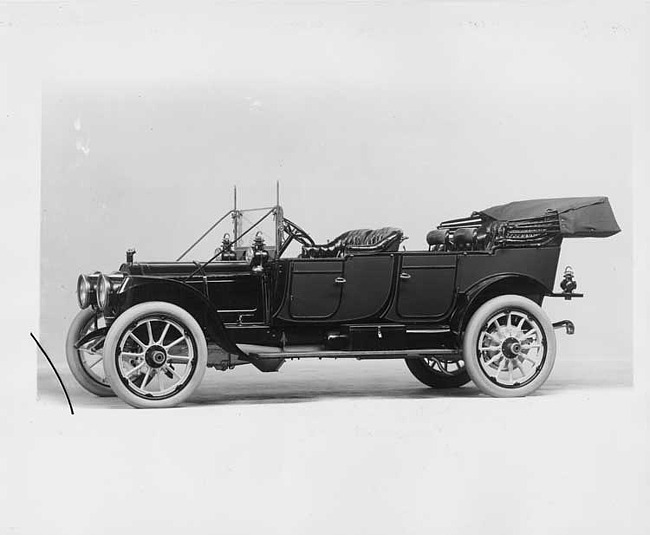 1912 Packard 6 touring car, left side view, top lowered