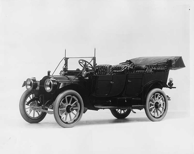 1912 Packard 30 Model UE touring car, three-quarter front view, left side, top lowered