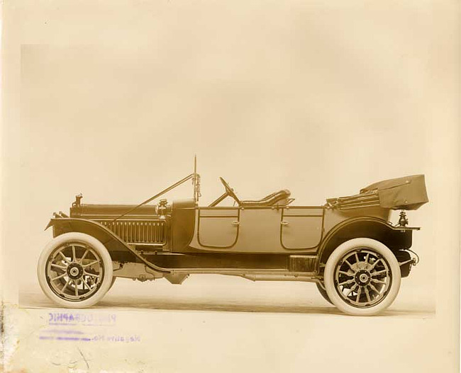 1912 two-toned Packard left side view, top lowered