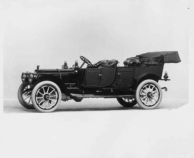 1912 Packard 6 touring car, left side view, top lowered