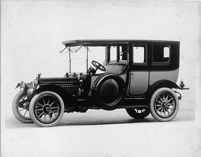 1913 Packard 38 two-toned limousine, left side, with two spare tires shown covered