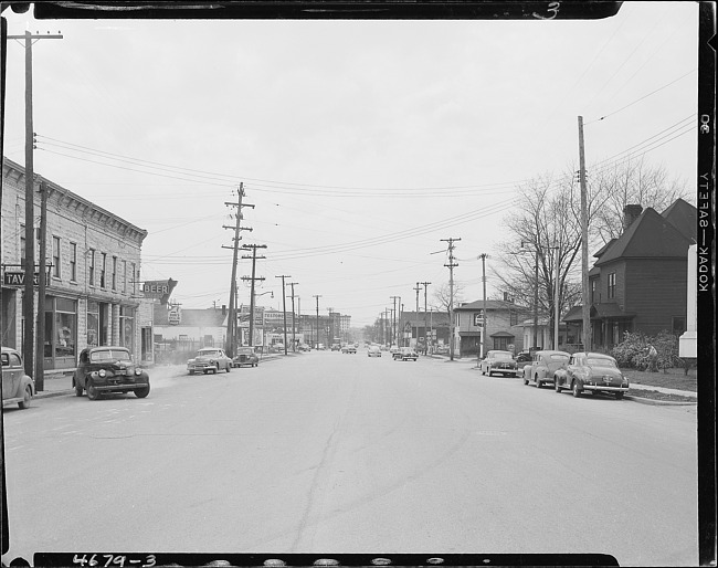 Tavern, houses, street scene