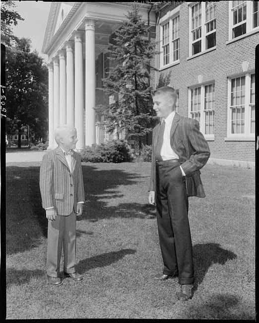 Boys modeling sport coats and pants