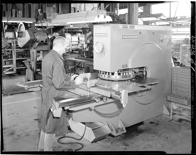 Man working at a Weidemann machine