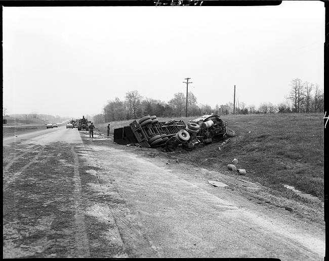 Overturned semi-truck on highway