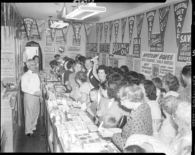 Customers at jewelry store sale