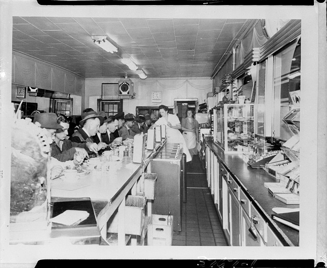 Lunch counter with businessmen