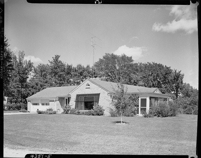 Exterior of ranch style home with screen porch